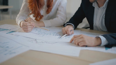 reachXOD - Capital Restructuring in a Crisis - business women reviewing financial reports
